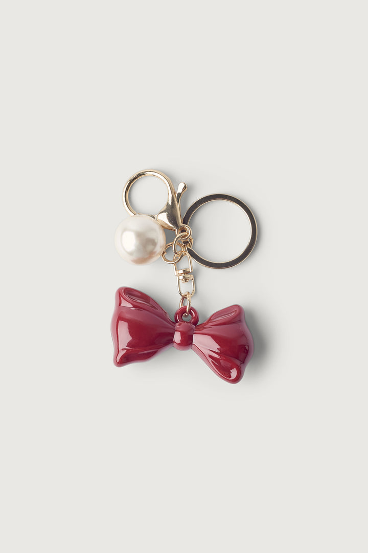 BOW AND PEARL BAG CHARM in Red — alternate angle