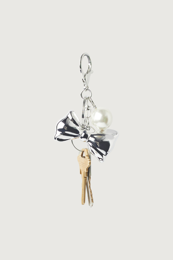 BOW AND PEARL BAG CHARM in Silver — alternate angle