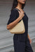Trapeze shoulder bag in black — image