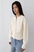Cinched waist button front cardigan in cream — main image