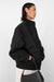 Nylon bomber with zip-off sleeves in black — main image