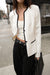 Contrast trim button front collarless blazer in cream black — main image