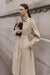 Oversized trench coat with funnel neck in beige — main image