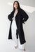 Oversized trench coat with funnel neck in black — main image