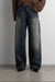 DARK WASH CURVED LEG JEAN