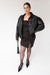 Tube mini dress with ruched detail in black — main image