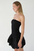 Smocked tube mini dress in black — main image