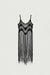 Macrame dress with long tassel overlay detail in black — main image