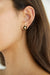 Daisy pearl studs in gold — main image