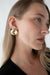 Warped stud earrings in gold — main image