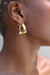 Abstract hoop earrings in gold — main image