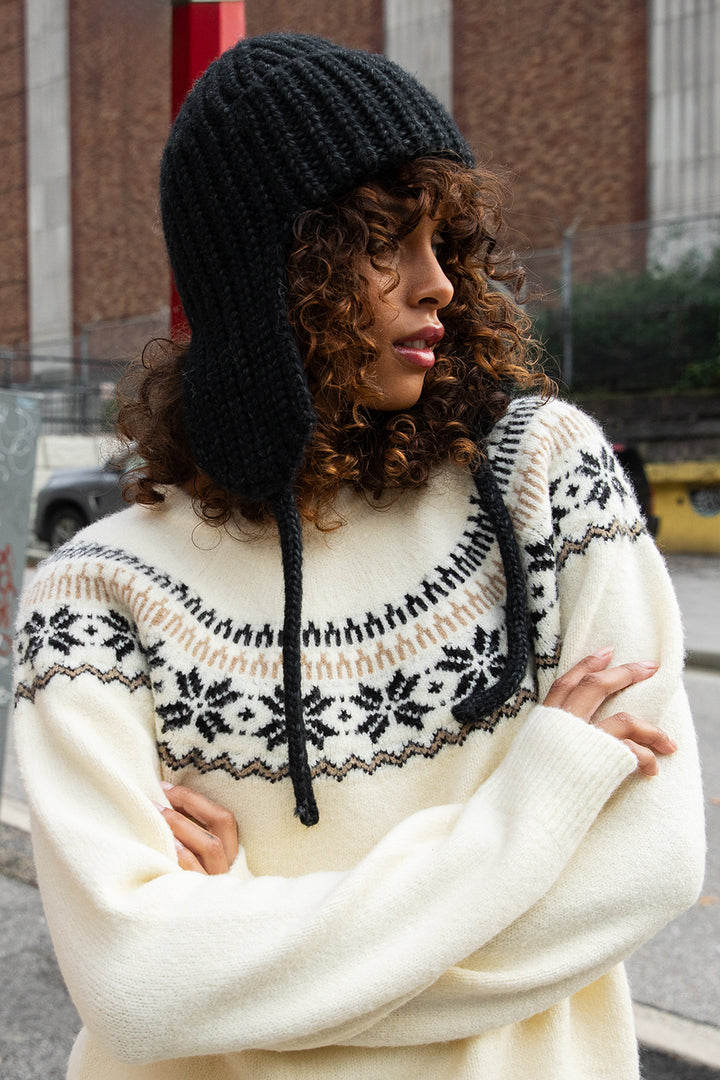 KNIT BEANIE WITH EAR FLAPS in Black — alternate angle