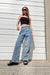 Distressed waist jean in light wash — main image