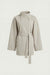 Belted funnel neck jacket in beige — main image