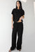 Crinkled rayon elastic waist pant in black — main image