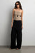 Lightweight crinkled pant with waist scarf in black — main image