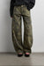 Camo print barrel leg pant in green print — main image
