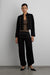 Draped waist tapered pant in black — main image