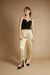 Satin pants with front slits in pale khaki — main image