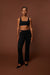 Side cut-out pants in black — main image