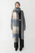Patterned scarf with tassels in blue plaid — main image