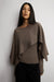 Cape and sweater set with asymmetrical hem in taupe — main image
