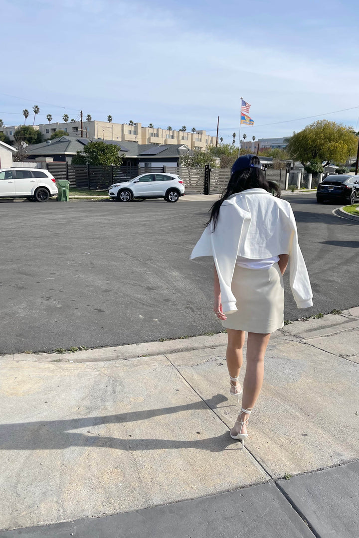 VEGAN LEATHER MINI SKIRT in Almond Milk — alternate angle