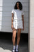 Mini ruffled skirt in white — main image