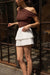 Pleated tiered mini skort in white — main image