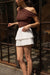 Pleated tiered mini skort in white — main image