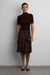 Woven print midi skirt with asymmetric hem in brown plaid — main image