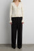 Rib-knit ruffled button front cardigan in cream — main image