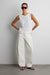 Open-knit sweater vest in ivory — main image