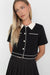 Cropped knit contrast trim top in black cream — main image