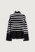 Striped turtleneck sweater in black cream — main image