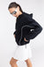 Fleece zip-up hoodie with contrast piping in black — main image
