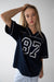 Football jersey in navy blazer — main image