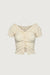 Ruffle halter top in ivory — main image