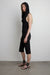 Draped cowl neck sleeveless top in black — main image