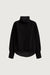 Oversized pleated mockneck blouse in black — main image