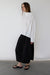 Oversized pleated mockneck blouse in ivory — main image