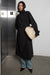 Oversized trench coat with funnel neck in black — main image