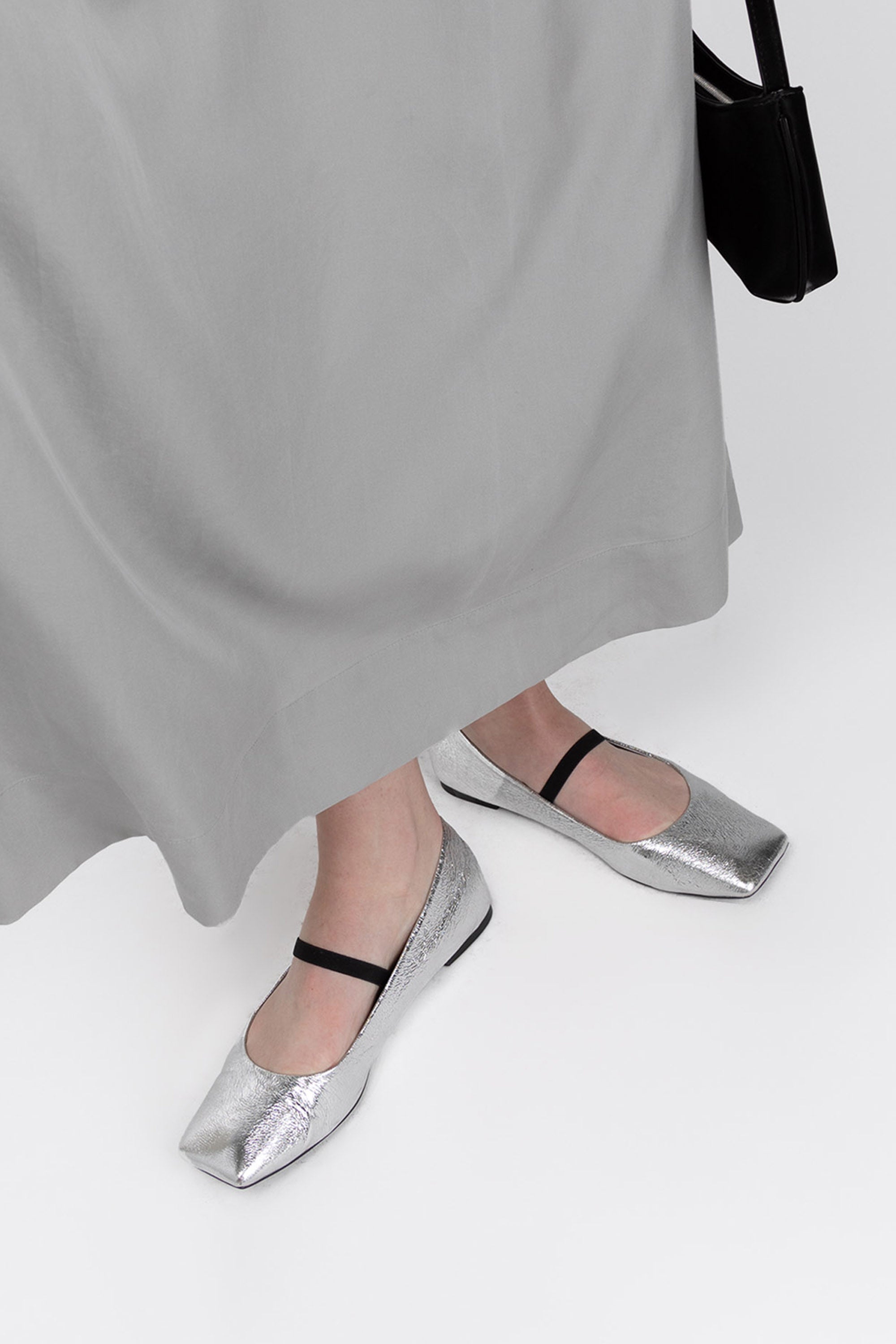 Black flats with silver buckle store