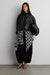 Vegan leather funnel neck jacket in black — main image