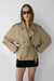 New short belted trench coat in light kelp — main image