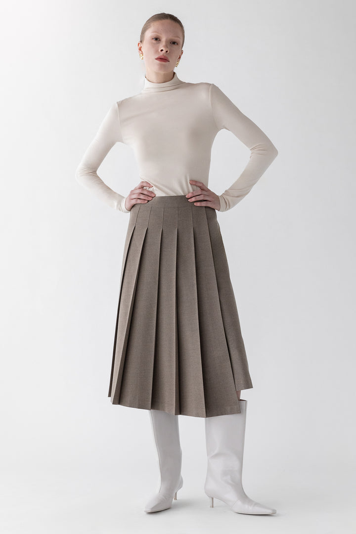 MIDI PLEATED ASYMMETRICAL SKIRT