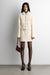 Boucle wool blend mini skirt in birch — main image