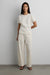Knit short sleeve ruched waist top in cream — main image