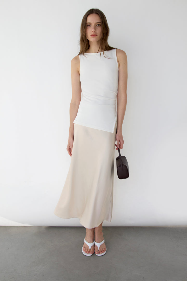 FITTED SLEEVELESS TOP WITH ASYMMETRICAL HEM in Cream — alternate angle